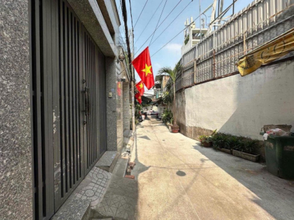 Bán nhà hẻm 214 Nguyễn Trãi, Quận 1 - ảnh 1