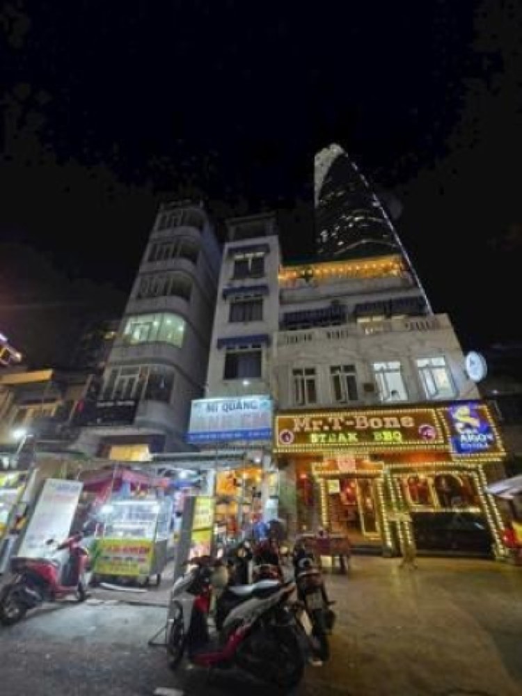 Bán nhà mặt tiền 70-72-74 Tôn Thất Đạm, Quận 1 - ảnh 1