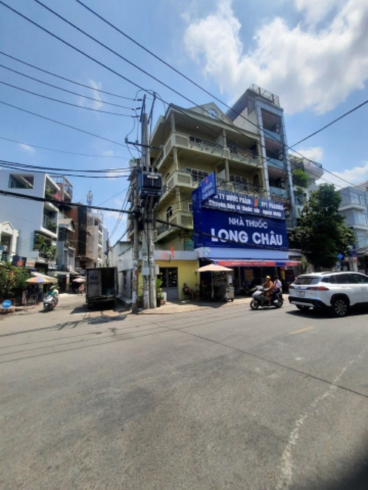 Bán nhà mặt tiền 26-28 Nguyễn Cửu Vân, Bình Thạnh - ảnh 1