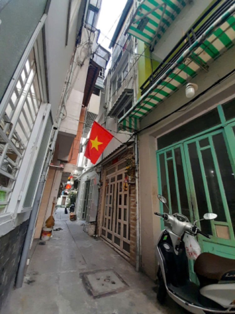 Bán nhà hẻm 214 Nguyễn Trãi, Quận 1 - ảnh 1